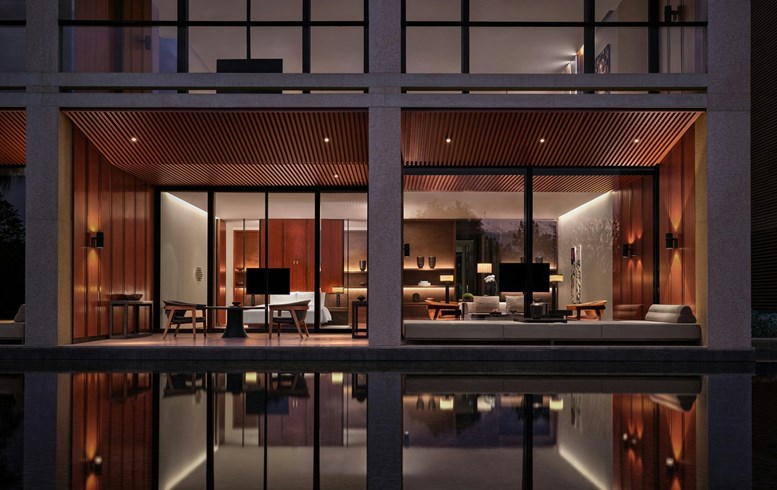 Water-facing villas at Lohkah Hotel & Spa at night