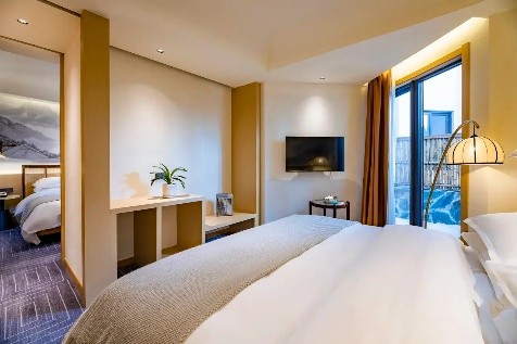 A Deluxe Room with mountain-facing windows at Xihai Hotel Huangshan