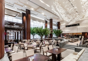 The high-ceilinged lobby lounge at Zhangjiajie Nabali Howard Johnson Resort