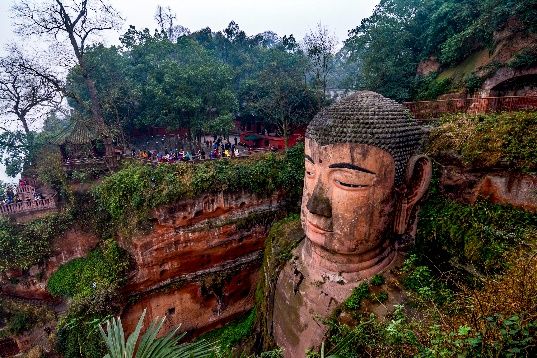 The Leshan Giant Buddha carved into the cliffside