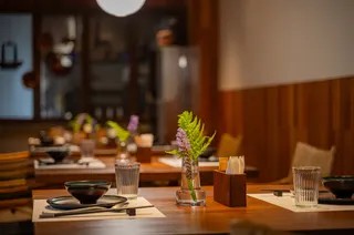The intimate dining room at SU House