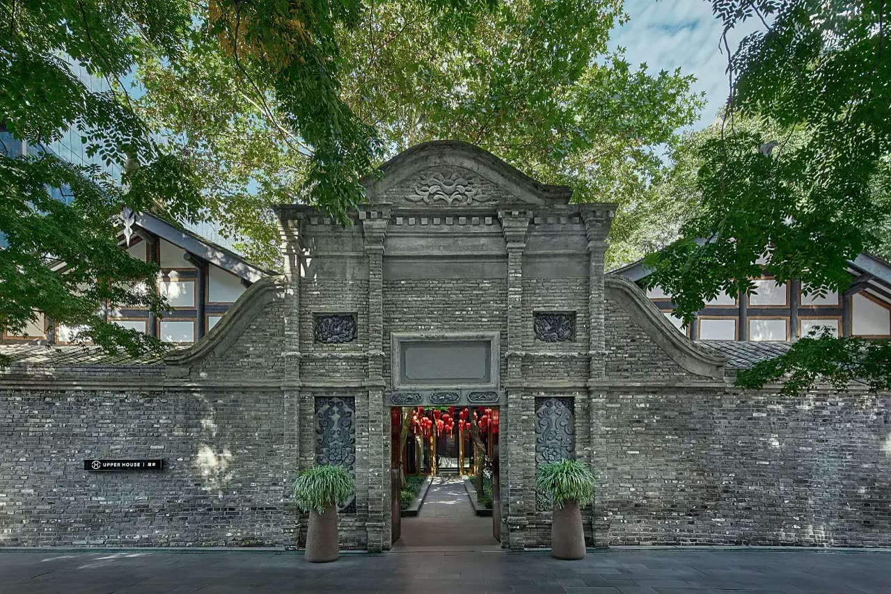 Restored gray-brick gateway entrance to The Upper House, Chengdu