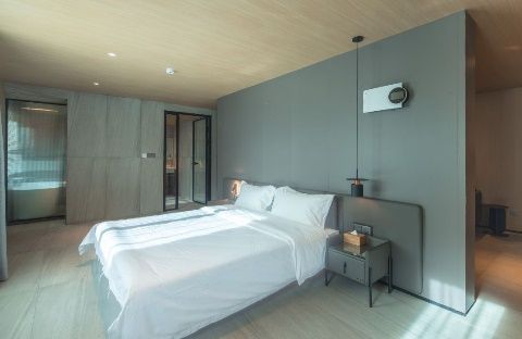 Simple guest room at Pingcuo Kangsang Everest Base Camp Hotel