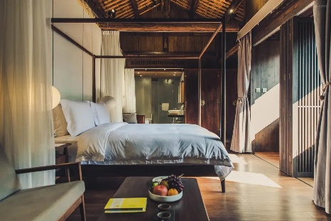 Bedroom inside the Tsingpu Tulou Retreat