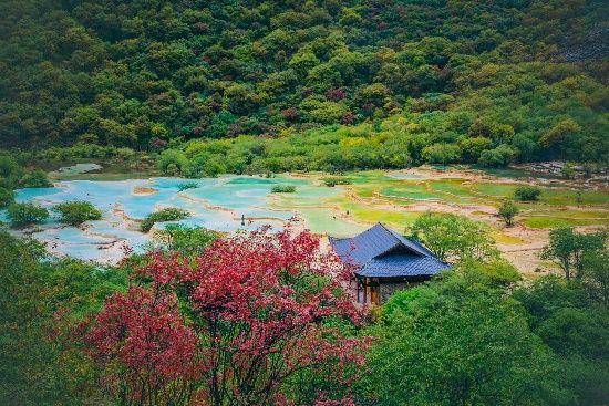 Terraced turquoise pools of Huanglong Scenic Area