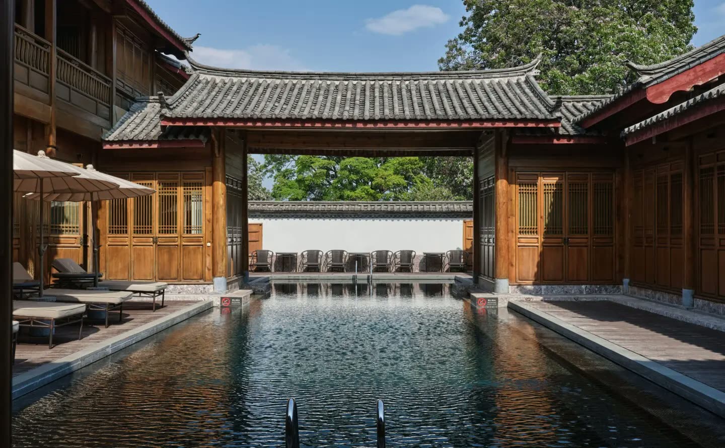 Outdoor swimming pool in the courtyard at Amandayan, Lijiang