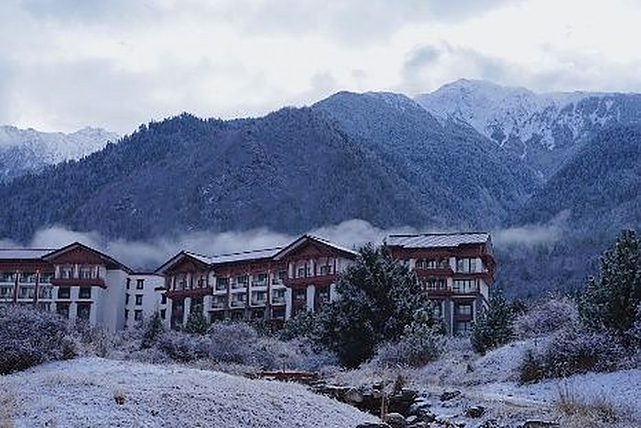 Guest room with mountain view at Hilton Linzhi Resort