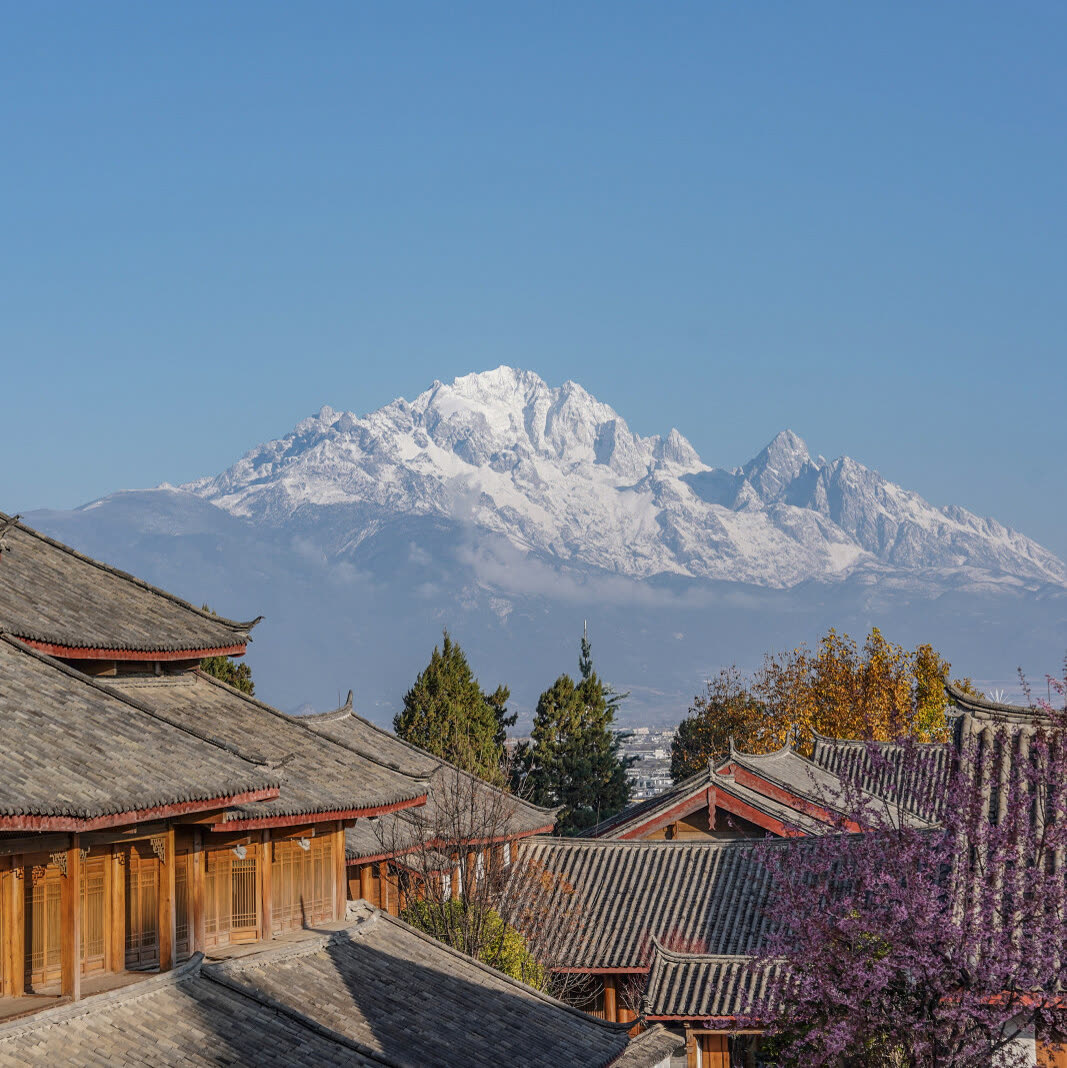 Snow mountain view over the old town from Amandayan in spring