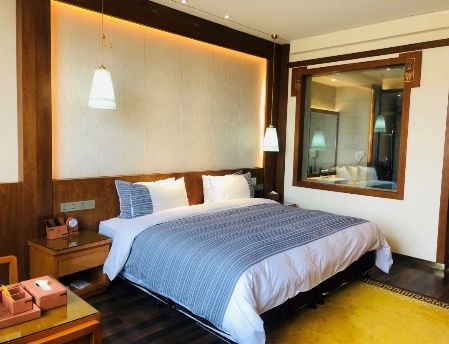 Guest room with Tibetan-style furnishings at Immersing Manor House
