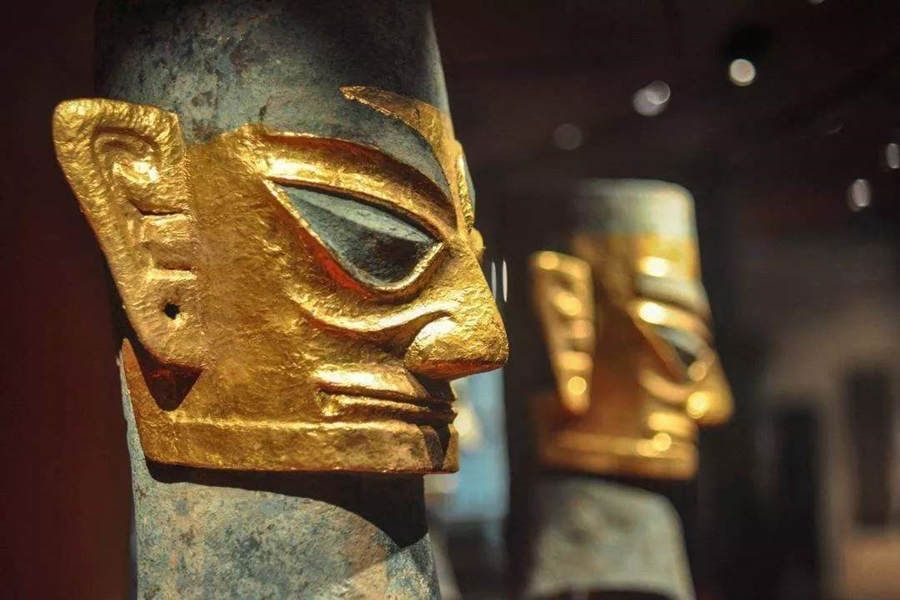 Gilded bronze masks on display at the Sanxingdui Museum