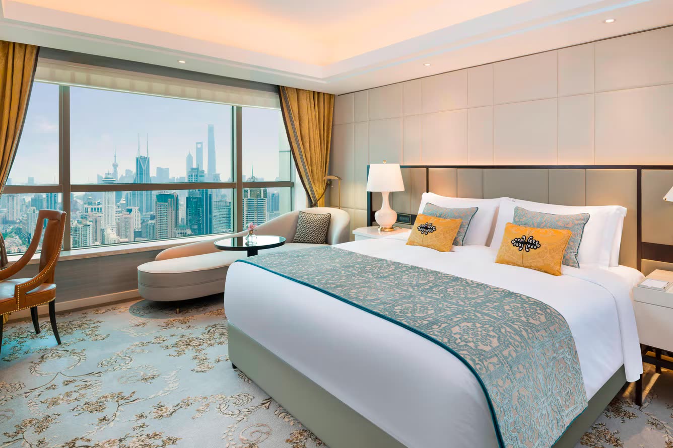 Guest room with city views at The St. Regis Shanghai Jingan