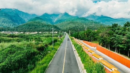 Road leading towards the mountains near Dali