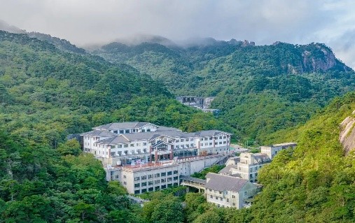 Aerial view of Xihai Hotel surrounded by Huangshan's forested peaks