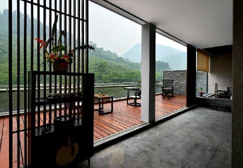 Private balcony with hot spring bath overlooking the mountains