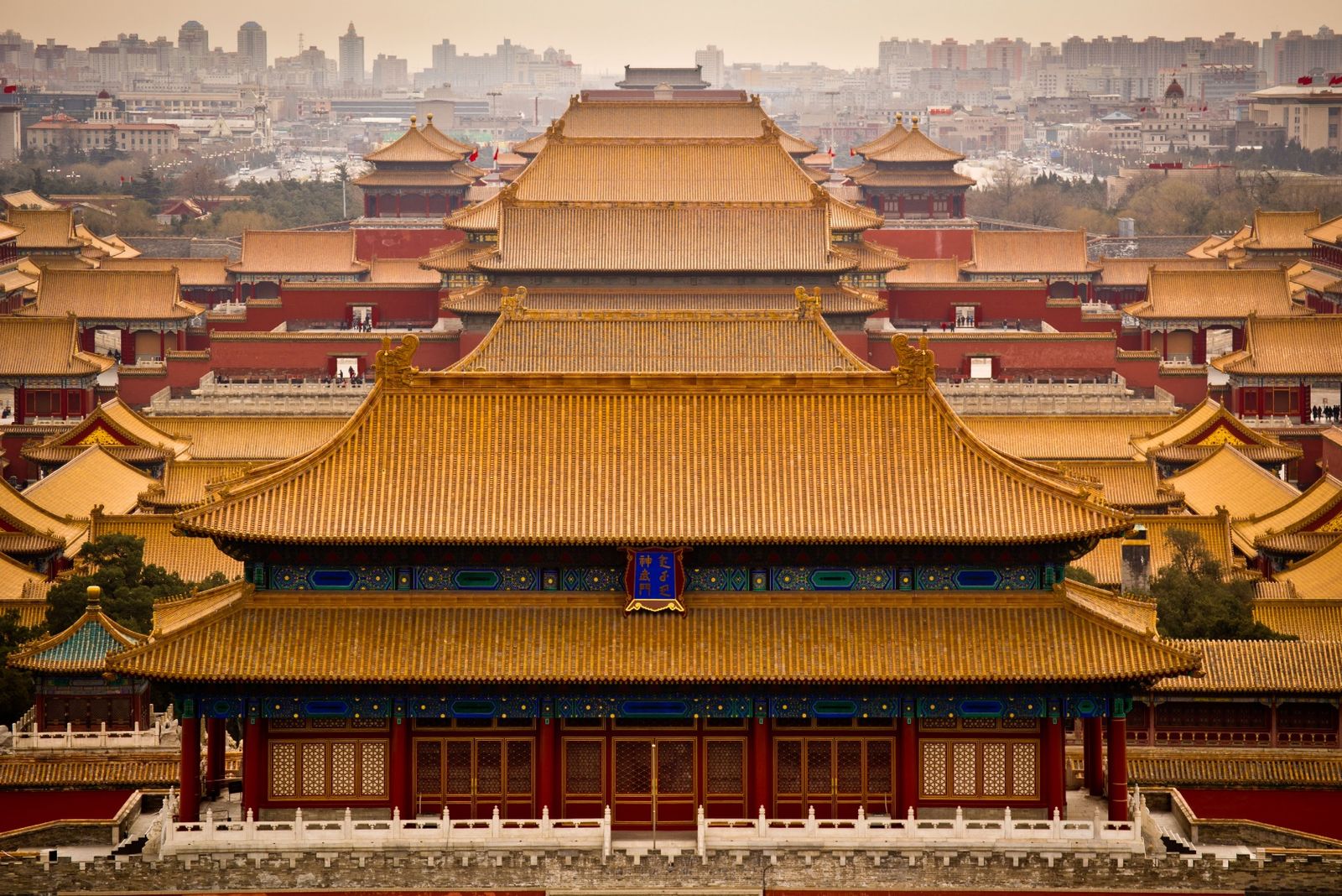 Aerial view of the Forbidden City with Beijing's skyline beyond