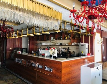 Lounge and coffee bar at Immersing Manor House, Gyantze