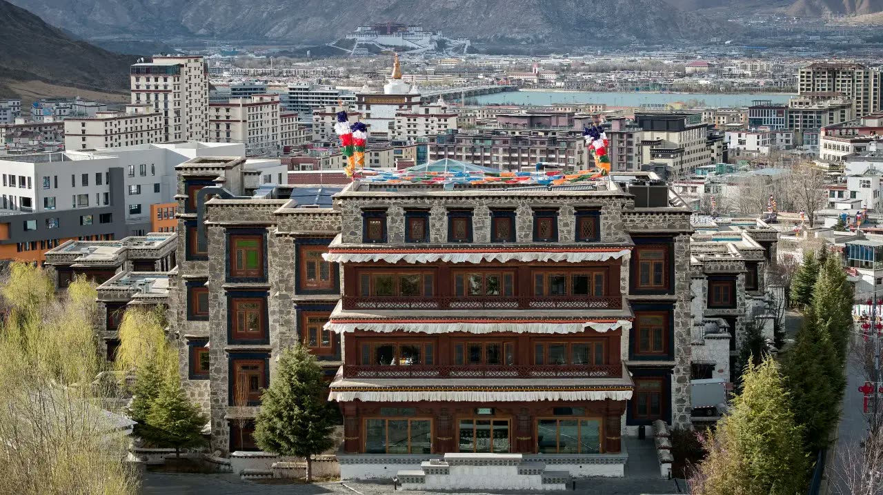 Songtsam Lhasa Linka with the Potala Palace on the skyline beyond